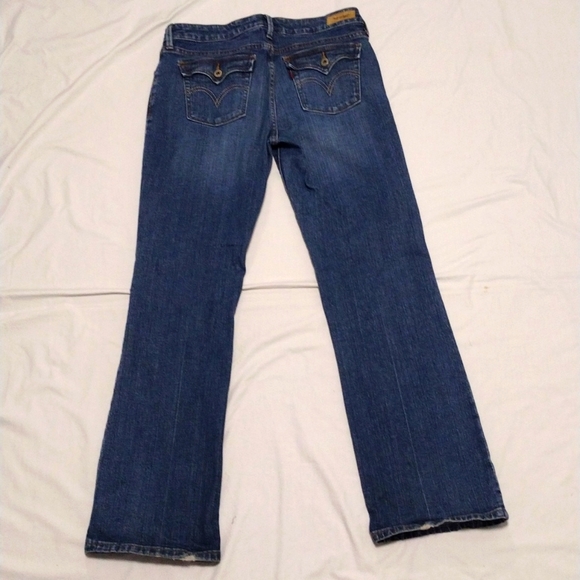 Levi's Women's Low Boot Cut Blue Denim Jeans size 12 Medium Back Button Pockets - Picture 9 of 10